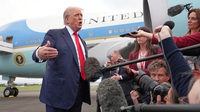 President Donald Trump speaks to members of the media after he arrived at Prestwick Airport in Ayrshire, Scotland, on Friday, (AP) President Donald Trump speaks to members of the media after he arrived at Prestwick Airport in Ayrshire, Scotland, on Friday, (AP)