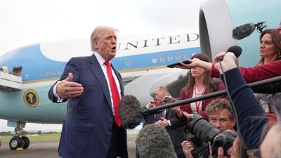 President Donald Trump speaks to members of the media after he arrived at Prestwick Airport in Ayrshire, Scotland, on Friday, (AP) President Donald Trump speaks to members of the media after he arrived at Prestwick Airport in Ayrshire, Scotland, on Friday, (AP)