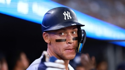 Aaron Judge reacts in the dugout after hitting a 2 run home run in the sixth inning during a game against the Toronto Blue Jays (Getty Images via AFP) Aaron Judge reacts in the dugout after hitting a 2 run home run in the sixth inning during a game against the Toronto Blue Jays (Getty Images via AFP)