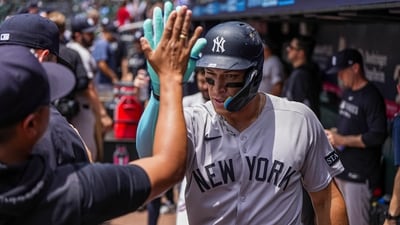 Aaron Judge (99) reacts in the dugout after hitting a home run against the Atlanta Braves (IMAGN IMAGES via Reuters Connect)