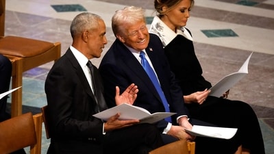 Donald Trump speaks with former U.S. President Barack Obama as Melania Trump looks on during the state funeral for former U.S. President Jimmy Carter (Getty Images via AFP) Donald Trump speaks with former U.S. President Barack Obama as Melania Trump looks on during the state funeral for former U.S. President Jimmy Carter (Getty Images via AFP)