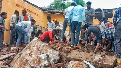 Locals during the rescue work after a government school building collapsed, in Jhalawar district, Rajasthan, Friday, July 25, 2025. (PTI)