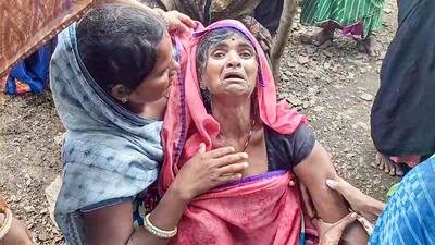 Parents mourn the death of their children after the roof of the Piplodi Primary School building collapsed, claiming the lives of seven students and injuring several others, in Rajasthan’s Jhalawar. (ANI Twitter) Parents mourn the death of their children after the roof of the Piplodi Primary School building collapsed, claiming the lives of seven students and injuring several others, in Rajasthan’s Jhalawar. (ANI Twitter)