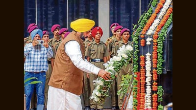 Punjab chief minister Bhagwant Mann pays homage at War Memorial on the occasion of Kargil Vijay Diwas in Chandigarh on Saturday. (PTI) Punjab chief minister Bhagwant Mann pays homage at War Memorial on the occasion of Kargil Vijay Diwas in Chandigarh on Saturday. (PTI)