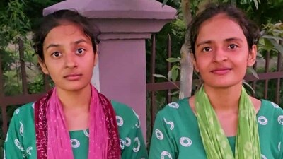 22-year-old twin sisters Gunjan and Muskan, both natives of Jind district, arrived for exam with their father and brother. (HT Photo)