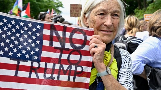 An anti-Trump demonstrator attends a rally organised by the campaign group Stop Trump Coalition, protesting the visit of U.S. President Donald Trump, in Edinburgh, Scotland, Britain, July 26, 2025. REUTERS/Lesley Martin(REUTERS)