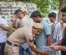 Aspirants undergo frisking before they appear for the Haryana Staff Selection Commission (HSSC) Common Eligibility Test (CET) 2025 in Gurugram on Saturday. (PTI) Aspirants undergo frisking before they appear for the Haryana Staff Selection Commission (HSSC) Common Eligibility Test (CET) 2025 in Gurugram on Saturday. (PTI)