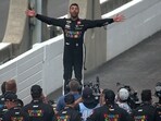 Bubba Wallace celebrates after winning the NASCAR Cup Series Brickyard 400 at Indianapolis Motor Speedway