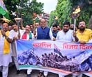 Deputy chief minister Brajesh Pathak leading a torch procession in Lucknow on Saturday. (HT PHOTO) Deputy chief minister Brajesh Pathak leading a torch procession in Lucknow on Saturday. (HT PHOTO)