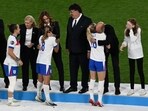 Prince William hugs England's forward #18 Chloe Kelly as team celebrates the Women's Euro 2025 win against Spain. Prince William hugs England's forward #18 Chloe Kelly as team celebrates the Women's Euro 2025 win against Spain.