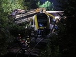 Emergency personnel work at the site where a local train derailed causing the death of several passengers, in Riedlingen near Biberach, Germany, July 27, 2025. 