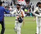 India's Ravindra Jadeja (2nd R) and India's Washington Sundar (R) after drawing the match on day five of the fourth Test at Old Trafford, in Manchester. (AFP)