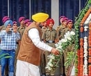 Punjab chief minister Bhagwant Mann pays homage at War Memorial on the occasion of Kargil Vijay Diwas in Chandigarh on Saturday. (PTI) Punjab chief minister Bhagwant Mann pays homage at War Memorial on the occasion of Kargil Vijay Diwas in Chandigarh on Saturday. (PTI)