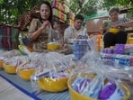 Bunyaluck Duchanee and Yupin Potiracha prepare packing goods for Thai residents who fled homes following clashes between Thai and Cambodian soldiers in Surin province, Thailand, Friday, July 25, 2025. Bunyaluck Duchanee and Yupin Potiracha prepare packing goods for Thai residents who fled homes following clashes between Thai and Cambodian soldiers in Surin province, Thailand, Friday, July 25, 2025.