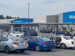 Emergency personnel stand outside a Walmart store, where a stabbing incident occurred, in Traverse City, Michigan, U.S. July 26, 2025, in this screen grab taken from a social media video. (Jerome Hartl/via REUTERS)