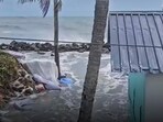 Sea water enters a low-lying area amid monsoon rains in Kerala. Sea water enters a low-lying area amid monsoon rains in Kerala.