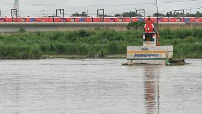 A temple in the Yamuna in New Delhi was submerged after water was released from Haryana, on Sunday. (Vipin Kumar/HT Photo) A temple in the Yamuna in New Delhi was submerged after water was released from Haryana, on Sunday. (Vipin Kumar/HT Photo)