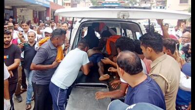 An injured person being taken for treatment after a stampede at Mansa Devi temple, in Haridwar on July 27. (Agency) An injured person being taken for treatment after a stampede at Mansa Devi temple, in Haridwar on July 27. (Agency)
