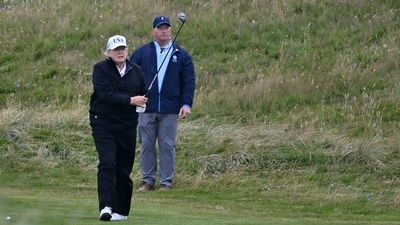 US President Donald Trump watches his drive from the fairway as he plays golf at the Trump Turnberry Golf Courses, in Turnberry on the south west coast of Scotland on July 27, 2025, during the third day of his visit to the country, since his second tenure as President began. (AFP) US President Donald Trump watches his drive from the fairway as he plays golf at the Trump Turnberry Golf Courses, in Turnberry on the south west coast of Scotland on July 27, 2025, during the third day of his visit to the country, since his second tenure as President began. (AFP)