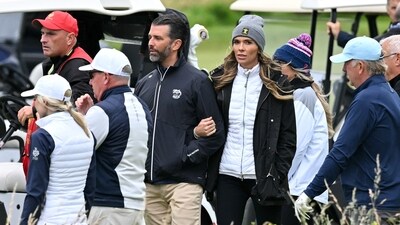 Donald Trump Jr and his wife Vanessa Trump walk together arm in arm as US President Donald Trump plays golf at the Trump Turnberry Golf Courses, in Turnberry. (AFP) Donald Trump Jr and his wife Vanessa Trump walk together arm in arm as US President Donald Trump plays golf at the Trump Turnberry Golf Courses, in Turnberry. (AFP)