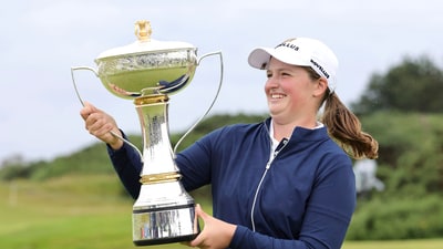 England's Lottie Woad holds the trophy after winning the Women's Scottish Open at the Dundonald Links, Irvine, Scotland, Sunday July 27, 2025. (Steve Welsh/PA via AP) (AP) England's Lottie Woad holds the trophy after winning the Women's Scottish Open at the Dundonald Links, Irvine, Scotland, Sunday July 27, 2025. (Steve Welsh/PA via AP) (AP)