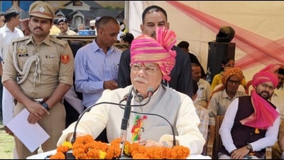 Himachal governor Shiv Pratap Shukla speaking during the inauguration of International Minjar Fair on Sunday. (HT Photo)