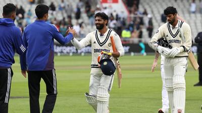 India's Ravindra Jadeja (2nd R) and India's Washington Sundar (R) after drawing the match on day five of the fourth Test at Old Trafford, in Manchester. (AFP) India's Ravindra Jadeja (2nd R) and India's Washington Sundar (R) after drawing the match on day five of the fourth Test at Old Trafford, in Manchester. (AFP)