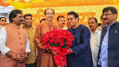 Shiv Sena (UBT) chief Uddhav Thackeray being greeted by Maharashtra Navnirman Sena President Raj Thackeray on his birthday. (PTI) Shiv Sena (UBT) chief Uddhav Thackeray being greeted by Maharashtra Navnirman Sena President Raj Thackeray on his birthday. (PTI)