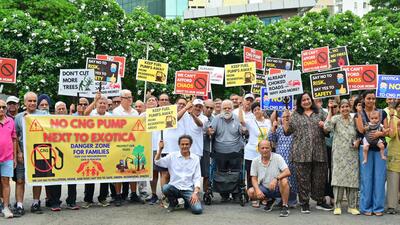 Residents holding a protest against proposed CNG station at Golf Course Road in Gurugram on Sunday. (Parveen Kumar/HT Photo) Residents holding a protest against proposed CNG station at Golf Course Road in Gurugram on Sunday. (Parveen Kumar/HT Photo)