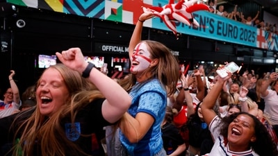 Fans gather in London - BOXPARK Wembley, London, Britain - July 27, 2025 England fans celebrate winning the penalty shootout and the final Action Images via Reuters/Peter Cziborra (Action Images via Reuters)