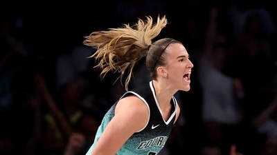 Sabrina Ionescu #20 of the New York Liberty celebrates after making a three point shot in the second half against the Indiana Fever (Getty Images via AFP)