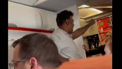 Other passengers are then seen tackling him to the floor of the plane. (X)
