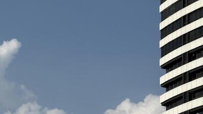 The perspective distortion made the 21-storey Gopaldas Bhawan loom high above the sky-bound clouds. (HT) The perspective distortion made the 21-storey Gopaldas Bhawan loom high above the sky-bound clouds. (HT)