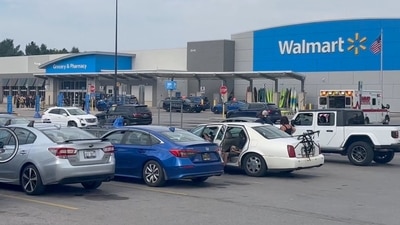 Emergency personnel stand outside a Walmart store, where a stabbing incident occurred, in Traverse City, Michigan, U.S. July 26, 2025, in this screen grab taken from a social media video. (Jerome Hartl/via REUTERS) (Jerome Hartl via REUTERS)