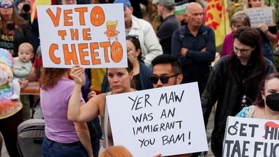 Anti-Trump demonstrators gather during a rally organised by the campaign group Stop Trump Coalition, protesting the visit of U.S President Donald Trump, in Aberdeen Scotland, Britain. July 26, 2025. REUTERS/Russell Cheyne (REUTERS)