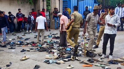 Footwears lie on the ground outside the Chinnaswamy Stadium following a stampede after a large number of fans gathered for the felicitation of IPL 2025 winning Royal Challengers Bengaluru in Bengaluru, Karnataka, Wednesday, June 4, 2025. (PTI File)