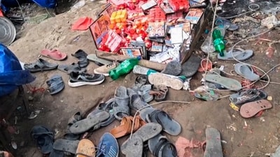 Haridwar stampede: Footwears lie at the site after a stampede broke out at Mansa Devi temple, in Haridwar on Sunday, July 27 (PTI) Haridwar stampede: Footwears lie at the site after a stampede broke out at Mansa Devi temple, in Haridwar on Sunday, July 27 (PTI)