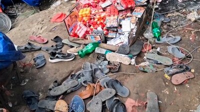 Piles of footwears were seen lying at the site after a stampede broke out at the Mansa Devi temple in Haridwar, Uttarakhand on Sunday (PTI) Piles of footwears were seen lying at the site after a stampede broke out at the Mansa Devi temple in Haridwar, Uttarakhand on Sunday (PTI)