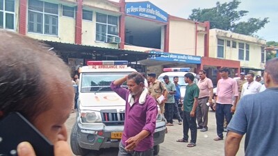 Relatives of were seen standing outside a hospital as the injured from Mansa Devi temple stampede were brought in. (AP) Relatives of were seen standing outside a hospital as the injured from Mansa Devi temple stampede were brought in. (AP)