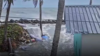 Sea water enters a low-lying area amid monsoon rains in Kerala. (PTI)