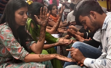 Women across the city have been queuing up to get mehendi applied on their hands on the occasion of Teej festival. (Photo: Vipin Kumar/HT (For representational purposes only)) Women across the city have been queuing up to get mehendi applied on their hands on the occasion of Teej festival. (Photo: Vipin Kumar/HT (For representational purposes only))