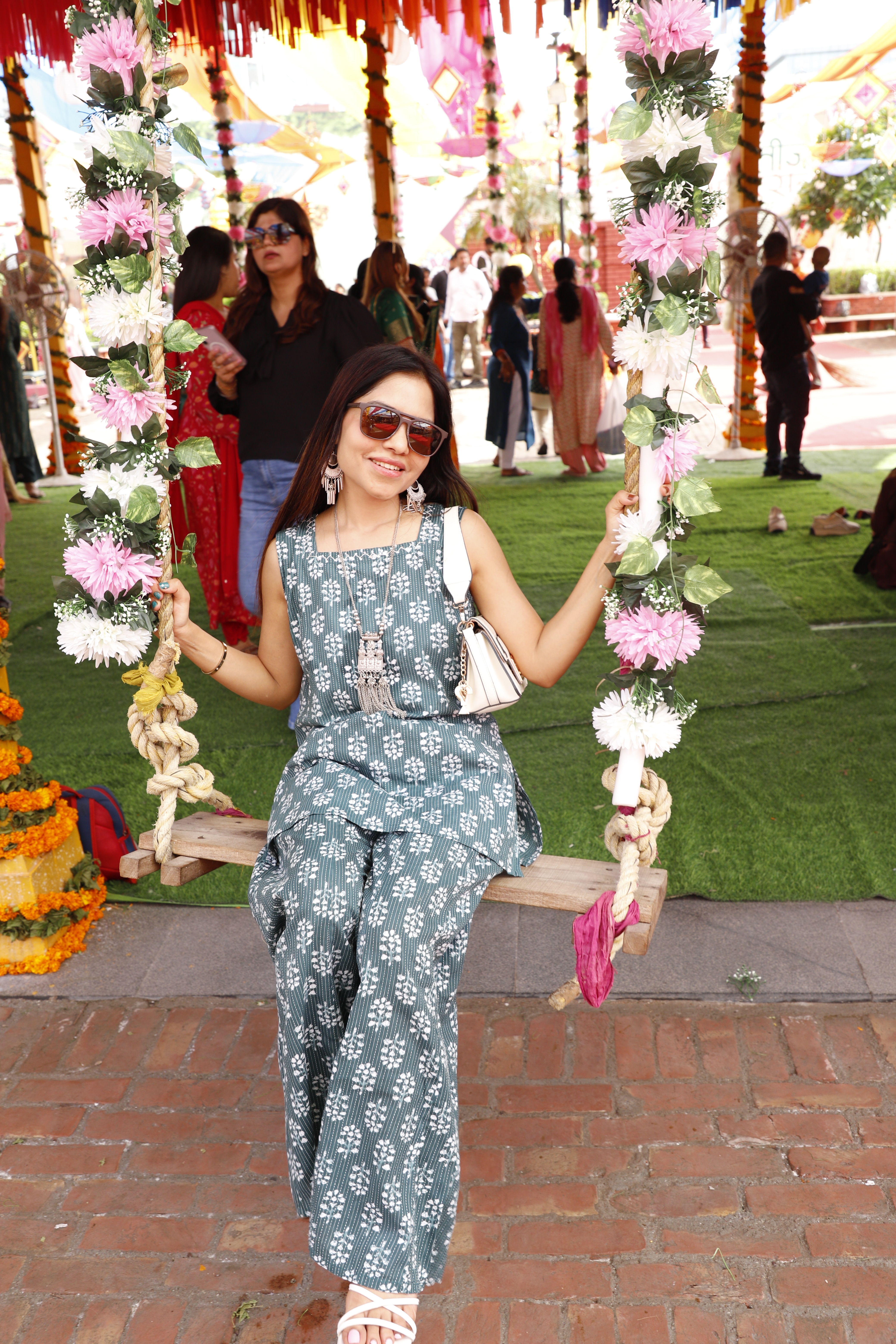 Spotted enjoying sawan ke jhoole (monsoon swings) while celebrating Teej was lifestyle influencer Shivani Singh. (Photo: Shantanu Bhattacharya/HT )