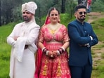 Bride Sunita Chauhan with grooms Pradeep and Kapil Negi during their traditional polyandrous wedding ceremony in Himachal Pradesh’s Shillai village, attended by members of the Hatti tribe.