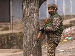 A security personnel stands guard near the site of the encounter, at Gujjarpati area in Sopore, Baramulla district of Jammu and Kashmir A security personnel stands guard near the site of the encounter, at Gujjarpati area in Sopore, Baramulla district of Jammu and Kashmir