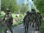 Security forces near the encounter site near the Dachigam National Park in Srinagar on Monday. (Waseem Andrabi /HT)