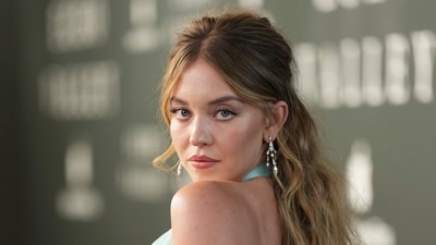 Amid recent backlash from her jeans campaign, Sydney Sweeney was spotted at a lake house in Idaho with a mystery man, sharing intimate moments. (Photo by Scott A Garfitt/Invision/AP) (Scott A Garfitt/Invision/AP) Amid recent backlash from her jeans campaign, Sydney Sweeney was spotted at a lake house in Idaho with a mystery man, sharing intimate moments. (Photo by Scott A Garfitt/Invision/AP) (Scott A Garfitt/Invision/AP)