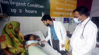 Doctors attending on an injured person after the Barabanki temple stampede on Monday. (PTI PHOTO) Doctors attending on an injured person after the Barabanki temple stampede on Monday. (PTI PHOTO)