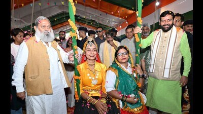 Haryana chief minister Nayab Singh Saini and transport minister Anil Vij during a Teej event in Ambala on Monday. (Sourced) Haryana chief minister Nayab Singh Saini and transport minister Anil Vij during a Teej event in Ambala on Monday. (Sourced)
