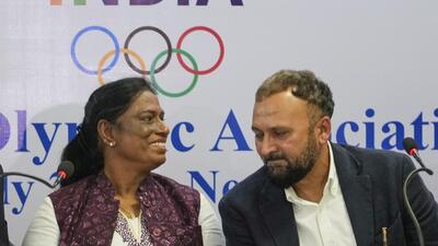 IOA President P.T. Usha talks with Chief Executive Officer Raghuram Iyer during a joint press conference in New Delhi. (AP) IOA President P.T. Usha talks with Chief Executive Officer Raghuram Iyer during a joint press conference in New Delhi. (AP)