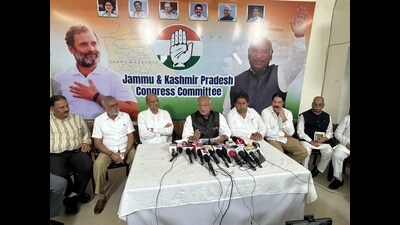J&K Congress president Tariq Hameed Karra along with party leaders address a press conference. (HT Photo)